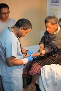 Dr. Harish checking out a skin rash