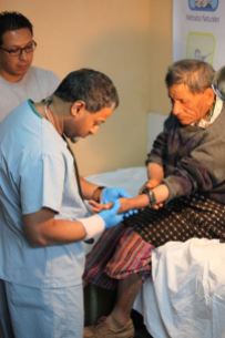 Dr. Harish checking out a skin rash